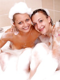 AdsPics presents: Naughty sexy young chicks taking a hot bubble bath together