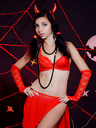 AdsPics presents: Only one look in the eyes of this fantastic slim teen will tell that she is a little devil inside. No further costume is needed.
