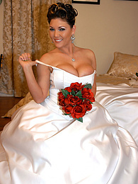 AdsPics presents: Horny bride Claire Dames enjoys licking her big tits and fingering her pussy