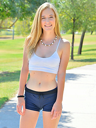 AdsPics presents: Sporty blonde babe Dakota strips her clothes and flaunts her hot body outdoors