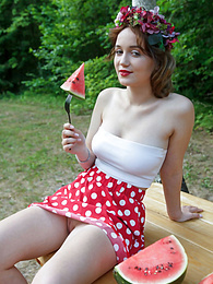 AdsPics presents: Nice belarusian stunner Rokki removes all clothes on a blanket in a backyard