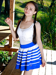 AdsPics presents: Fresh-Faced russian beauty Mia Grandy gets totally naked on a picnic table in a garden